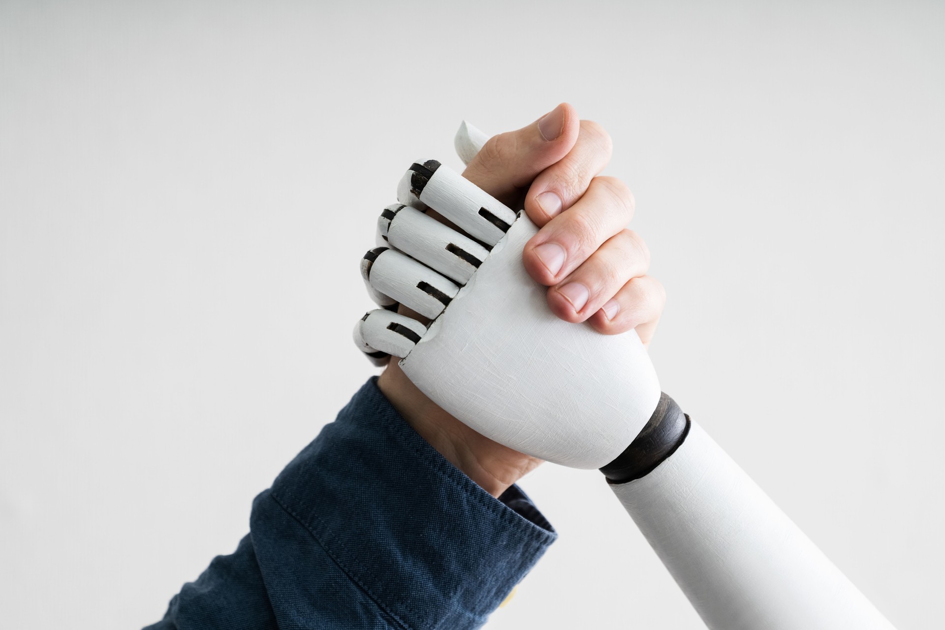 Imam And AI Robot Shaking Hands